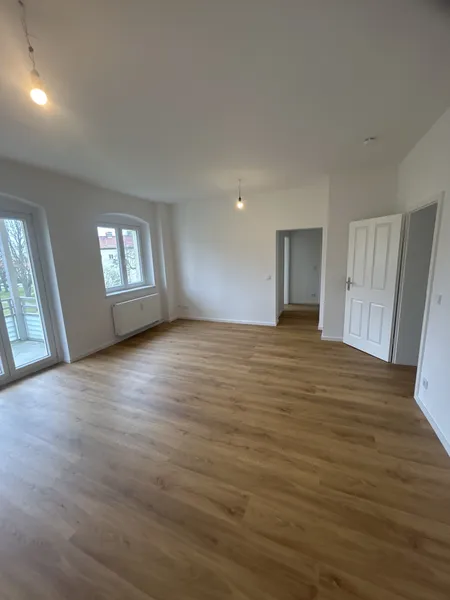 Erstbezug: 3,5 Zimmer Wohnung mit Balkon und Einbauküche im Herzen von Weißensee zu vermieten! — photo 1